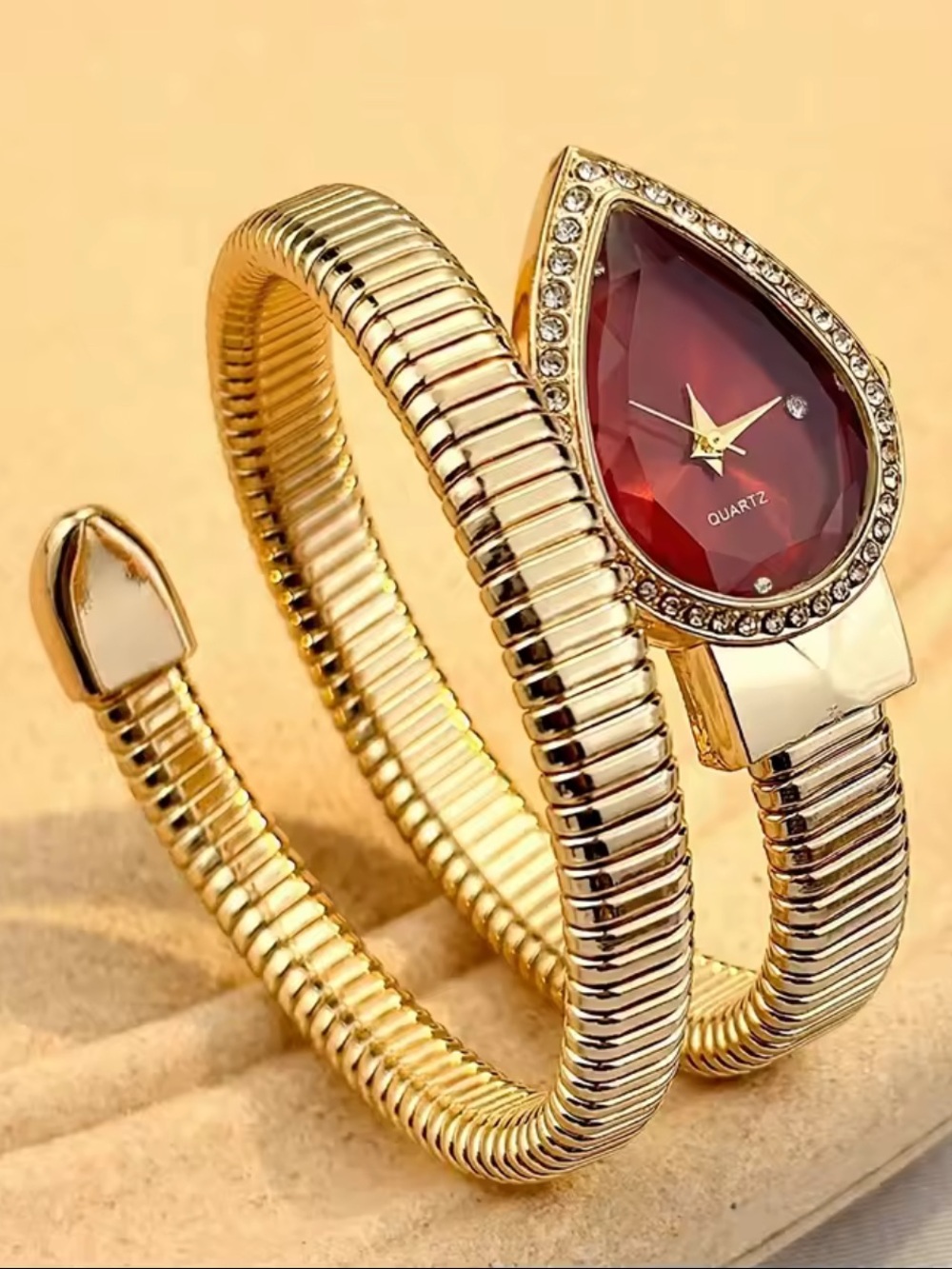 Kohl's Gold-Tone Coil Bracelet Watch with Red Teardrop Dial